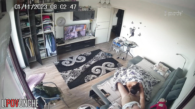 Curvy brunette making blowjob to a gray-haired man