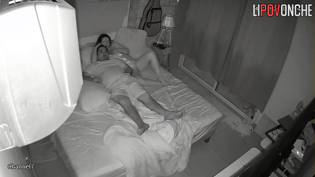 Guy fingering her pussy during a lazy fuck in the bed