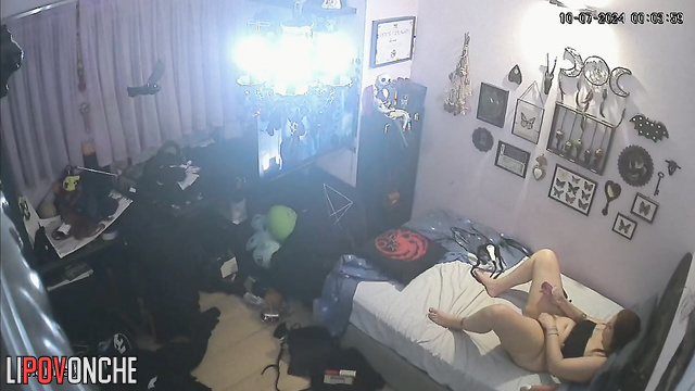 Brunette masturbates with a dildo and watches porn