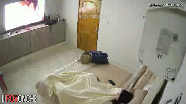 Brunette masturbating with a small sex toy under sheets