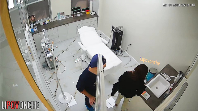 Babe getting beauty procedure topless (doctor enjoying it)