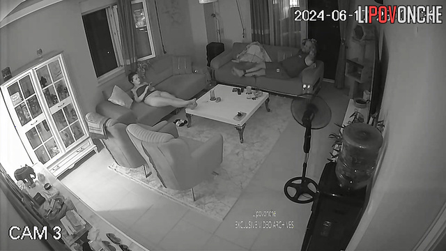 Tattooed couple jerk each other off in the living room