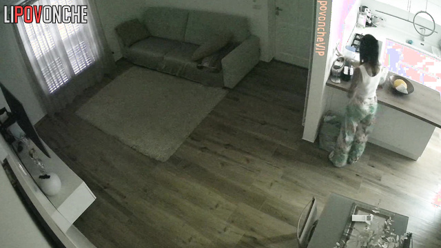 Busty brunette is bored with tv watching (living room tape)