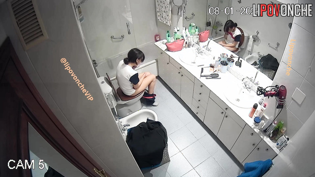 Pretty teen dressing up for the night party (bathroom video)