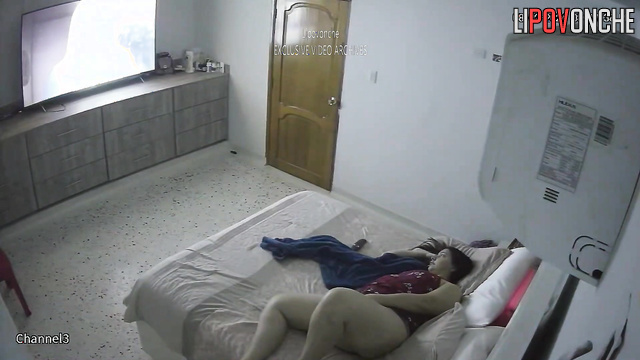 Single brunette masturbating alone during tv-watching