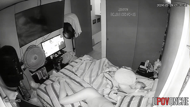 Sleeping people are watched in the bedroom this night