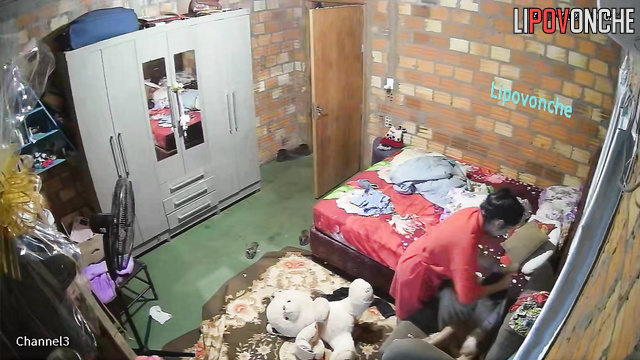 Asian mom is combing her relative's hair - bedroom video
