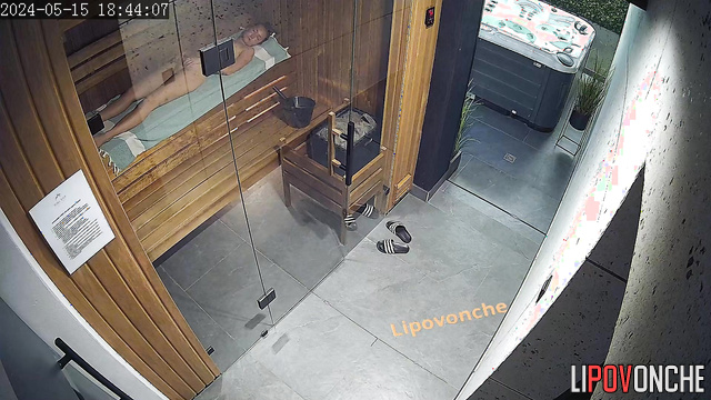 Naked woman relaxing naked in the sauna / hidden video