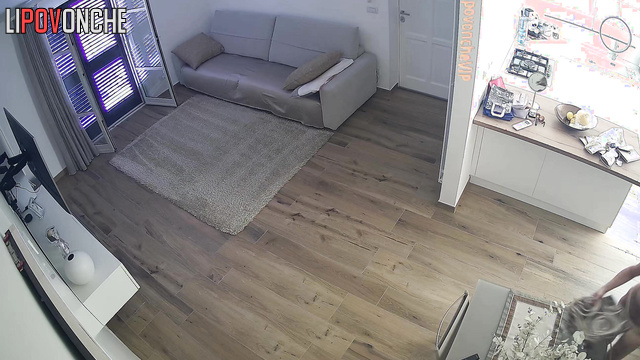 Lady loves to receive guests topless / living room