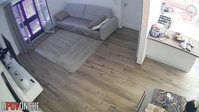 Lady loves to receive guests topless / living room