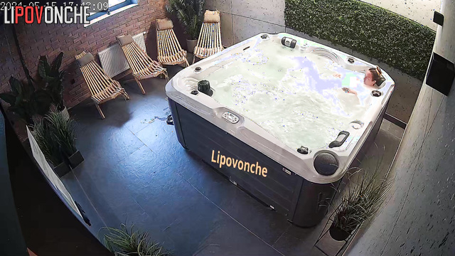 Rich naked blonde chilling in her private jacuzzi