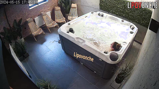 Rich naked blonde chilling in her private jacuzzi