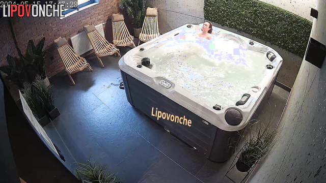 Rich naked blonde chilling in her private jacuzzi