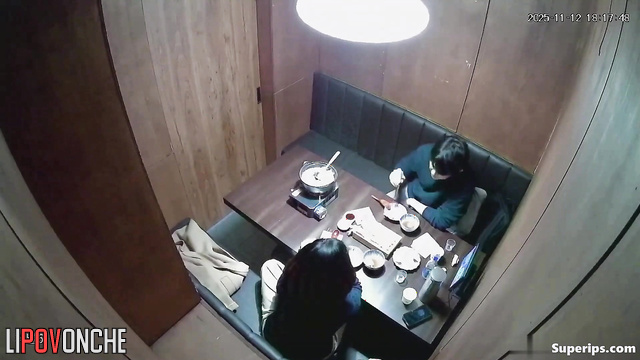 A Korean couple is having a steamy time in a private VIP room at a café