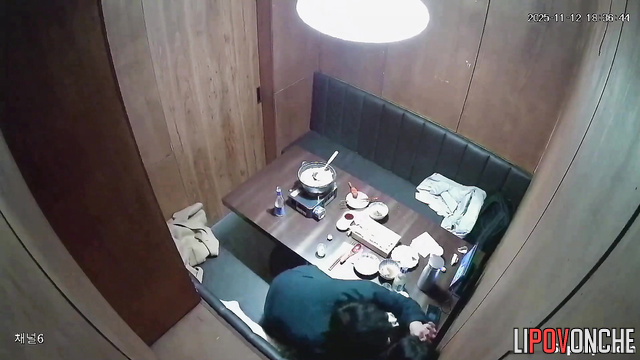 A Korean couple is having a steamy time in a private VIP room at a café