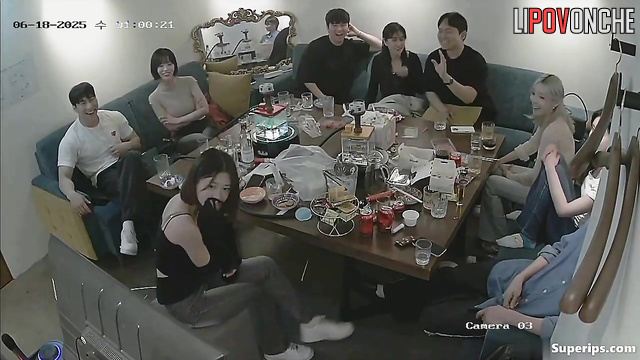 Asian company of friends are gathering together to have a good time