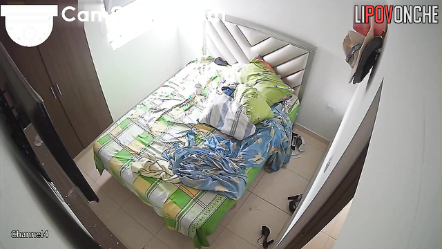 A beautiful girl with a voluptuous rear end enjoys viewing memes in bed while naked