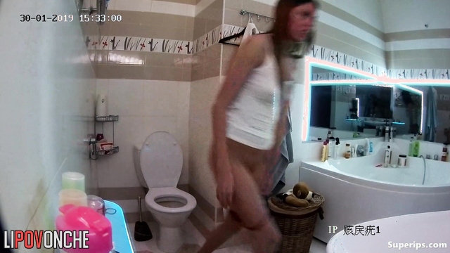 A husband secretly filmed his slender wife taking a bath and using the toilet