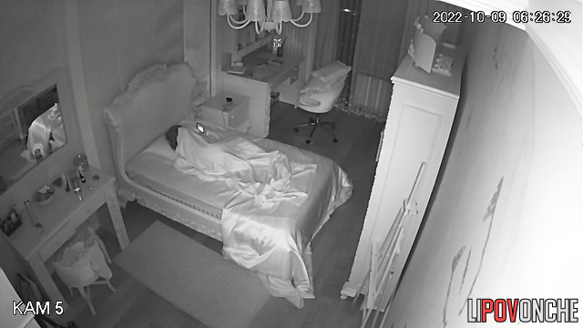 After waking up, a young teenage girl plays with her pussy while watching porn