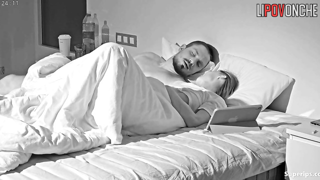 The boyfriend is masturbating vigorously while his skinny girlfriend licks his balls