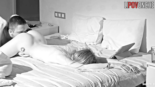 A tattooed beauty gently strokes her boyfriend's head as he licks her hot pussy