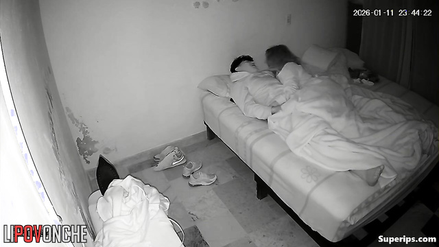 An adult girlfriend gently caresses her friend's cock, arousing him