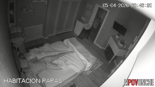 A pretty girl lazily fends off her husband's sexual advances at night