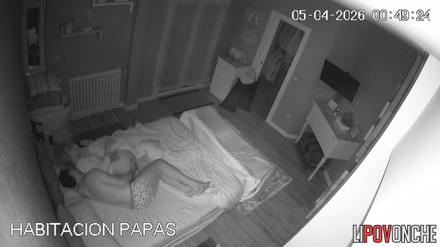 A pretty girl lazily fends off her husband's sexual advances at night