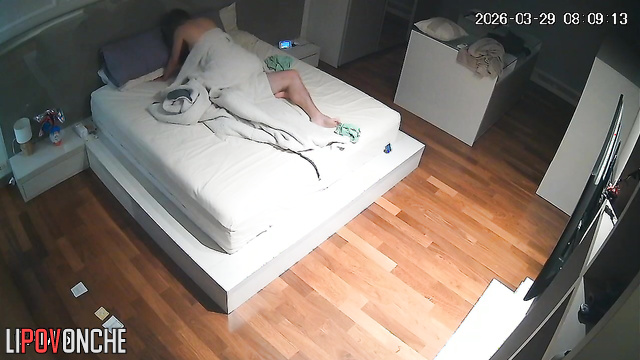 An aroused man is vigorously fucking his slender wife in the mouth