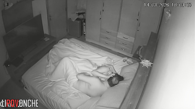 The wife actively jerks off her husband while he gently licks her hard nipples