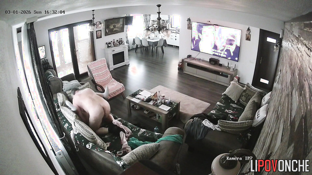 A sly milf pesters her bored husband, who's watching TV, to have a nice fuck