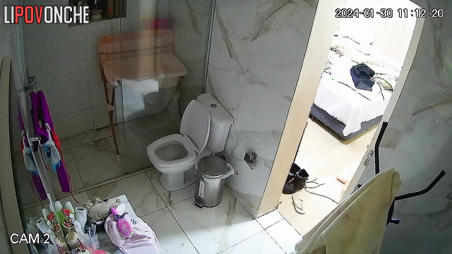 A full-figured girl bares her seductive, big ass as she takes off her pants to pee