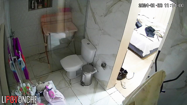 A full-figured girl bares her seductive, big ass as she takes off her pants to pee