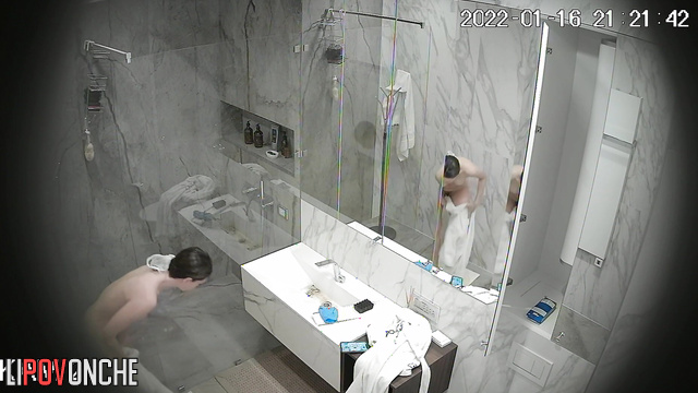 A skinny sporty girl is cleaning the bathroom completely naked