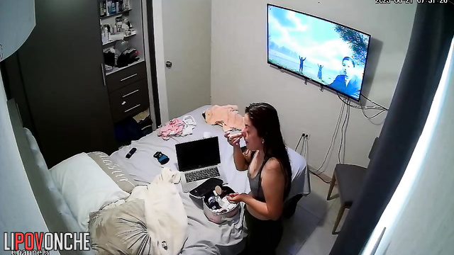 A hidden camera in the bedroom captured the sexy, naked body of a seductive mommy