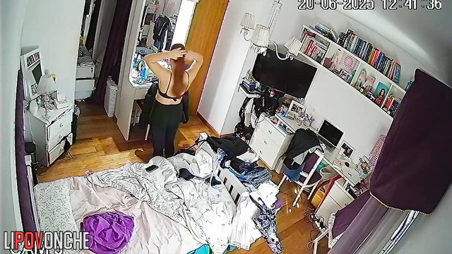 A seductive redhead admires how sexy her bare breasts look in different poses
