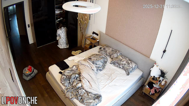 A skinny girl slowly takes off her robe, revealing her small breasts