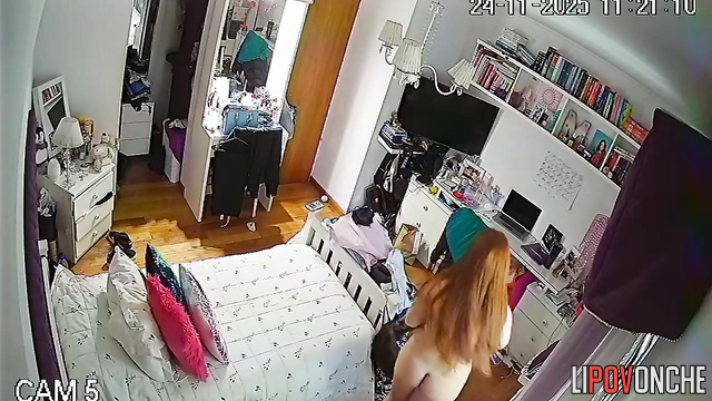 When she wakes up in the morning, the pretty redheaded girl undresses completely