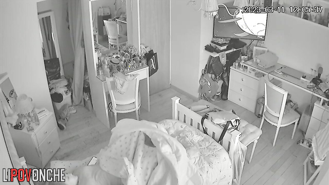 A young teenage girl pulls down her panties under the covers to masturbate