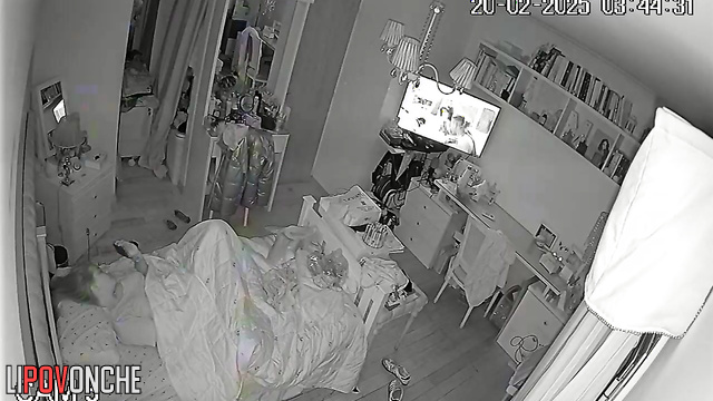 In the middle of the night, a pretty girl is playing with her seductive pussy