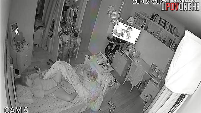 In the middle of the night, a pretty girl is playing with her seductive pussy