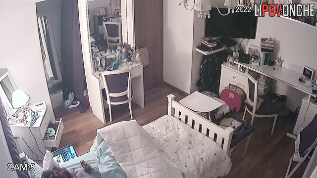 The girl took a break from watching the movie for a quick evening orgasm