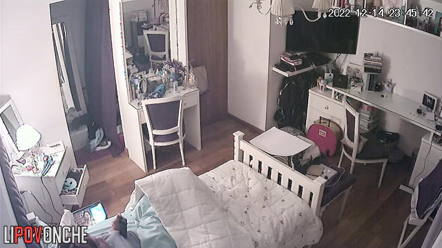 The girl took a break from watching the movie for a quick evening orgasm