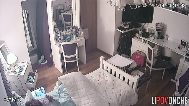 The girl took a break from watching the movie for a quick evening orgasm