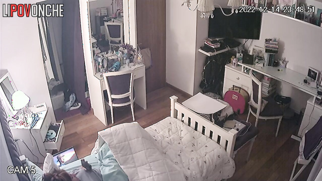 The girl took a break from watching the movie for a quick evening orgasm