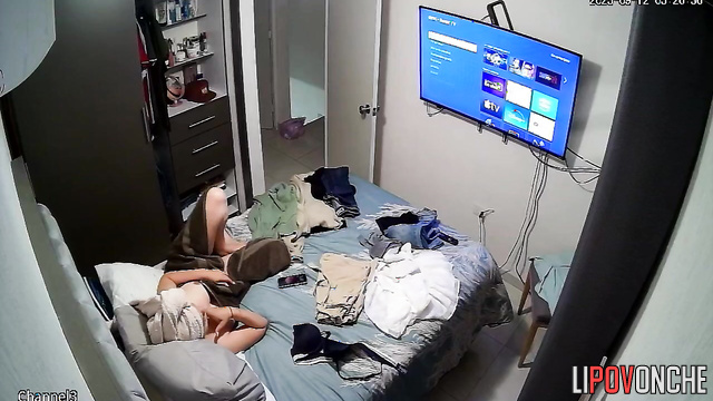 After her shower, the sleepy girl, bored, relaxes naked in bed