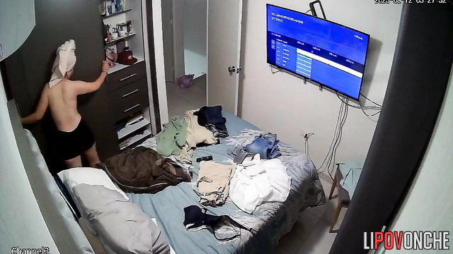 After her shower, the sleepy girl, bored, relaxes naked in bed
