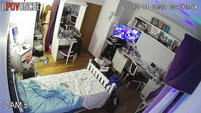 A  gorgeous girl turned on the holiday lights and stripped down to her panties