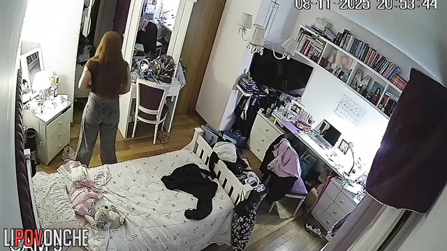 A red-haired beauty turned on her laptop camera and stripped in front of it
