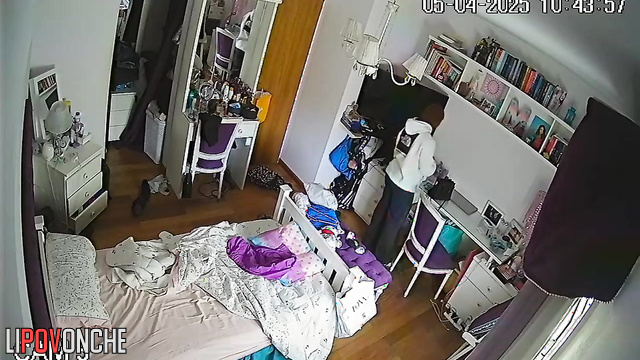 The girl wakes up and seductively takes off her T-shirt, baring her tits